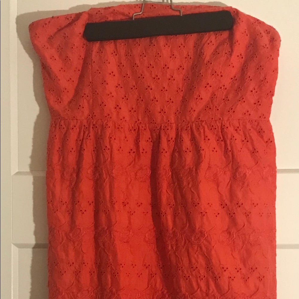 Strapless mid length eyelet orange dress